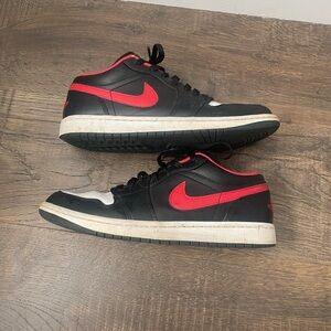 Black red and white Nike Jordan’s